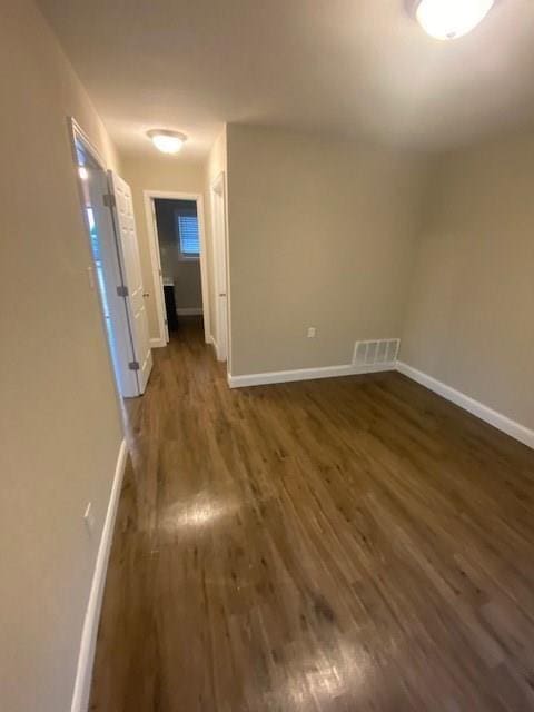 interior space featuring dark wood-type flooring