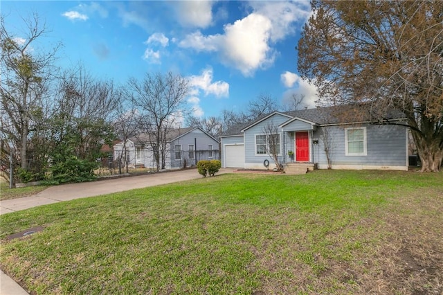 single story home featuring a garage and a front yard