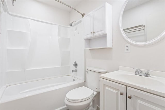 full bathroom with bathing tub / shower combination, vanity, and toilet