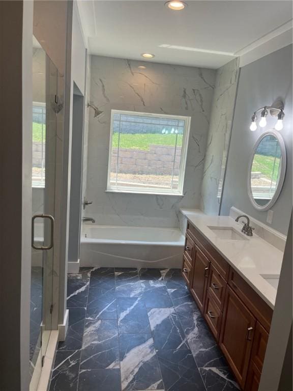 bathroom with vanity and plus walk in shower