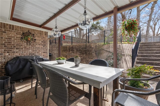 view of patio featuring outdoor dining space and grilling area