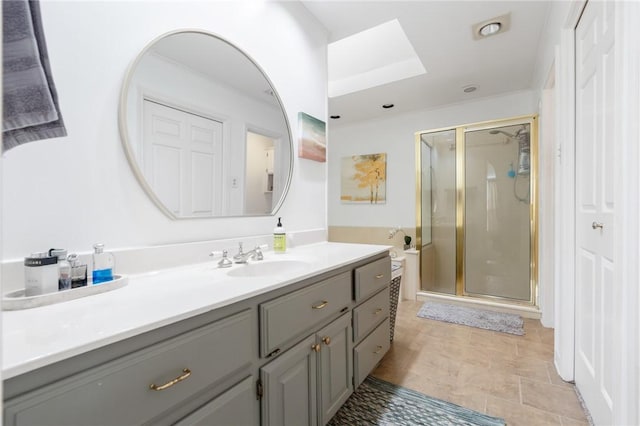 full bathroom with vanity and a stall shower