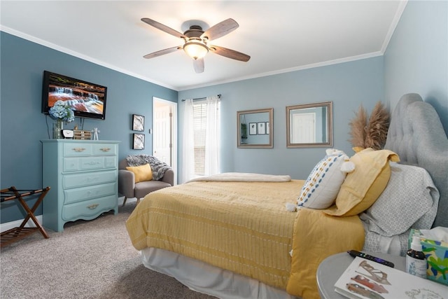 bedroom with carpet flooring, crown molding, and a ceiling fan