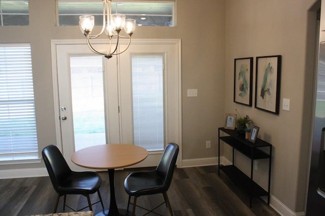 dining room featuring dark hardwood / wood-style floors and a wealth of natural light