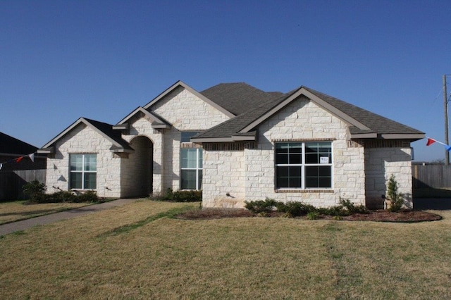 view of front facade with a front yard