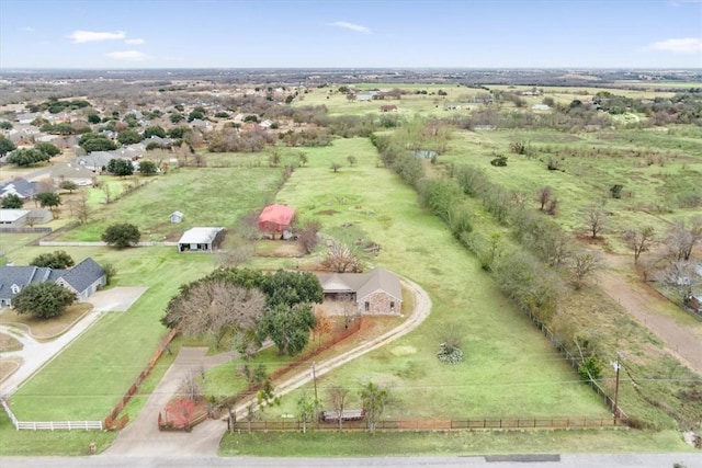 birds eye view of property featuring a rural view