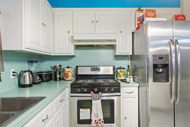 kitchen featuring white cabinetry and appliances with stainless steel finishes