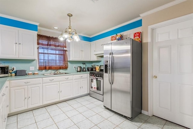 kitchen featuring pendant lighting, sink, crown molding, appliances with stainless steel finishes, and white cabinets