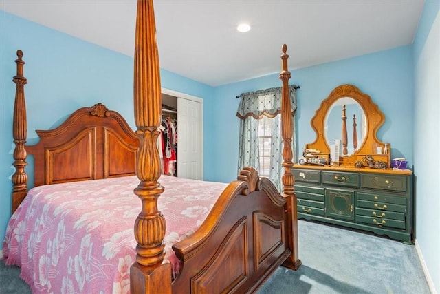 bedroom featuring light carpet and a closet