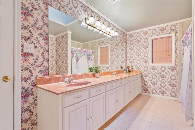 bathroom featuring vanity, tile patterned floors, and ornamental molding