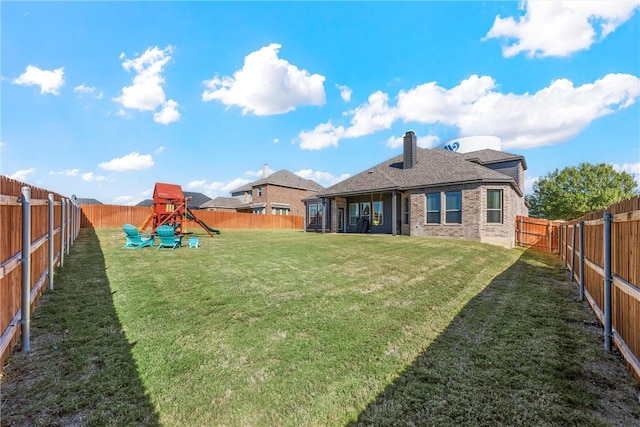 view of yard with a playground