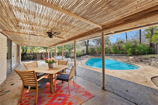 view of pool featuring a patio area and ceiling fan