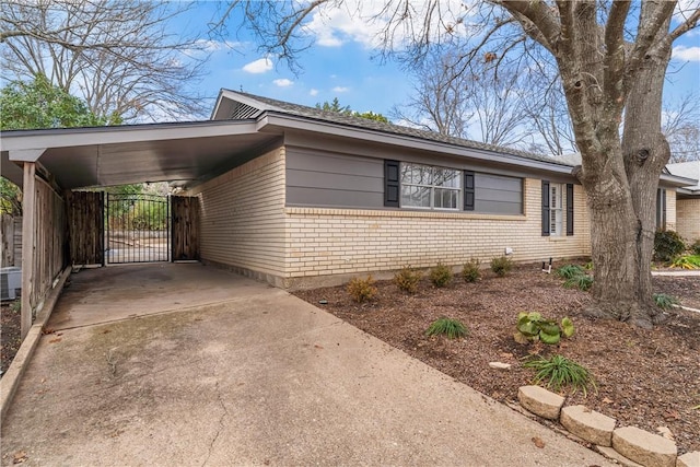 exterior space with a carport