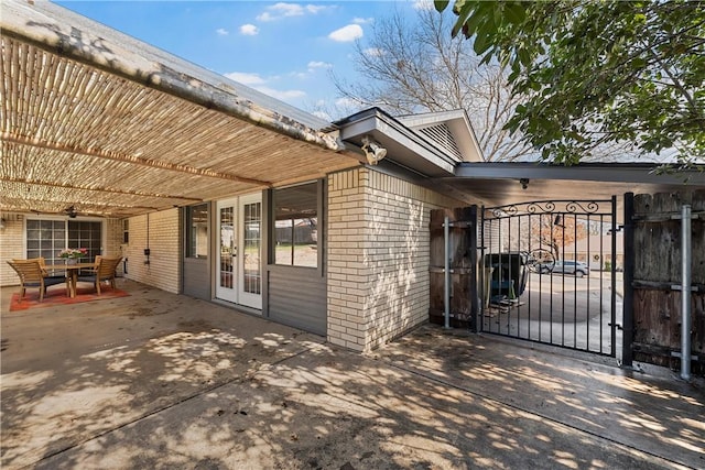 exterior space featuring a patio and french doors