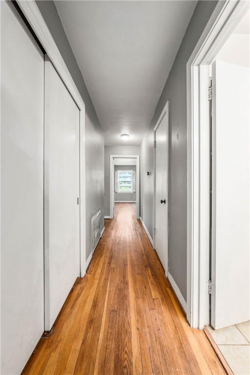 hall featuring light wood-type flooring