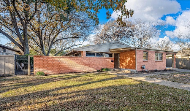 view of front of home with a front yard