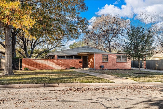 view of front of home with a front yard