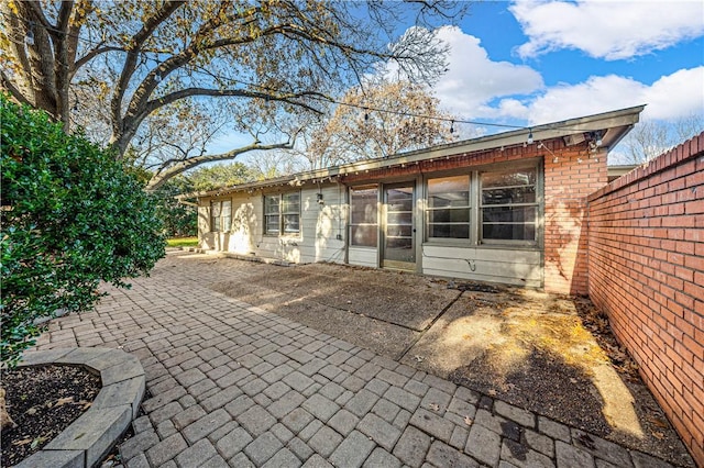 back of house featuring a patio