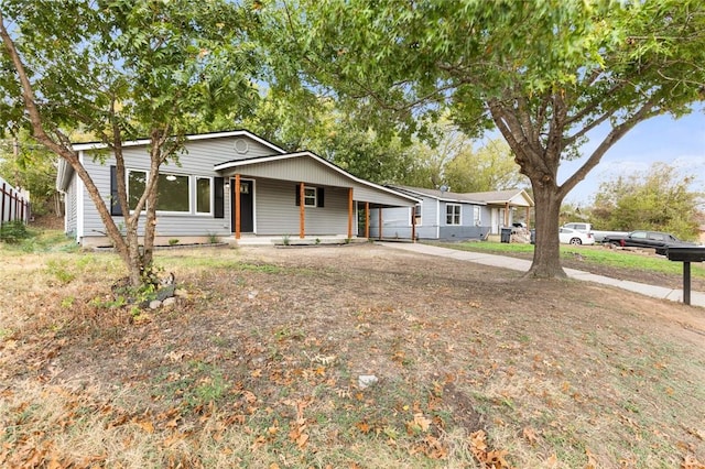 view of front facade featuring a carport