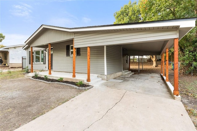 view of front facade featuring a carport