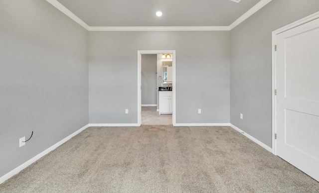 unfurnished room with light carpet and ornamental molding