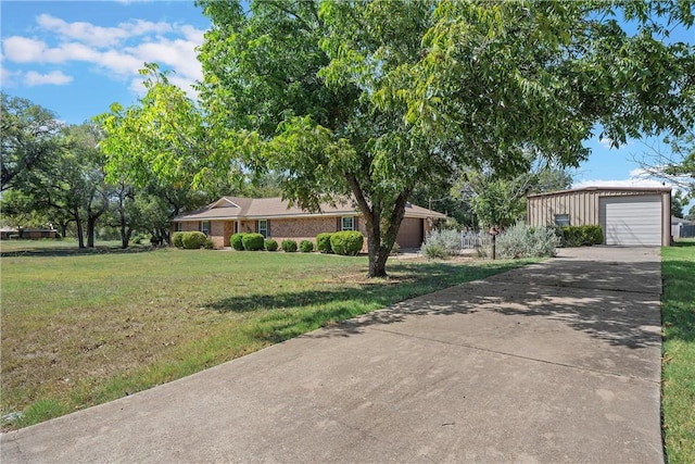 ranch-style home with a garage and a front yard