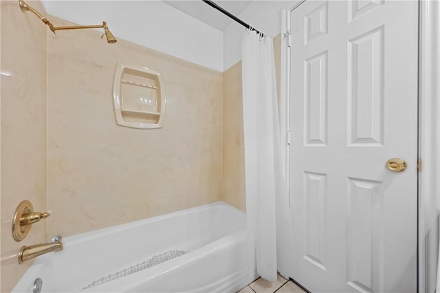 bathroom with tile patterned flooring and shower / bath combination with curtain