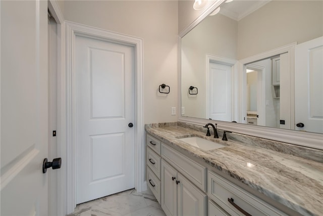 bathroom featuring vanity and crown molding