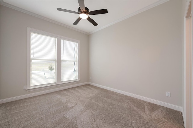 unfurnished room with carpet, ceiling fan, and crown molding