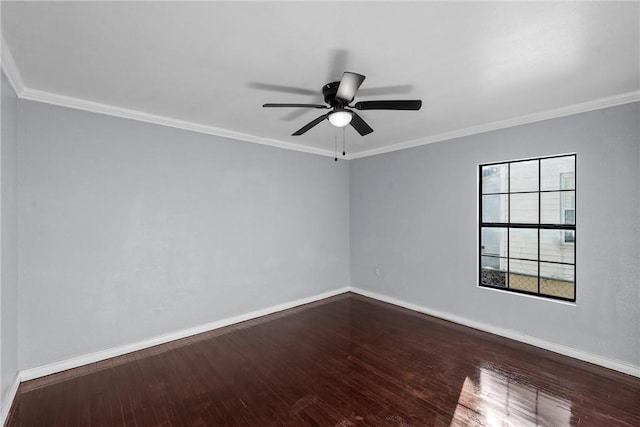 empty room featuring hardwood / wood-style flooring, crown molding, and ceiling fan