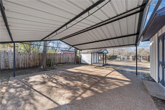 view of patio with a storage unit