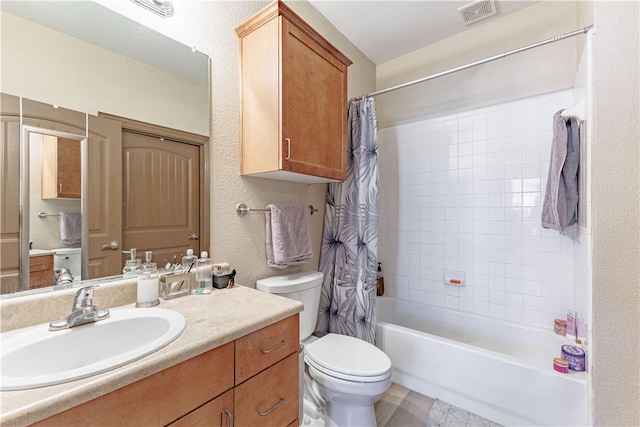 bathroom featuring vanity, shower / bathtub combination with curtain, visible vents, toilet, and a textured wall