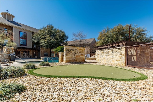 view of yard featuring a patio and a pergola