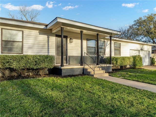 view of front of home with a porch and a front yard