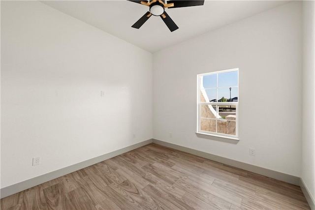 unfurnished room with light hardwood / wood-style floors and ceiling fan