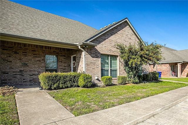 exterior space featuring a front yard