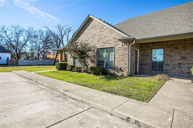 view of home's exterior featuring a lawn