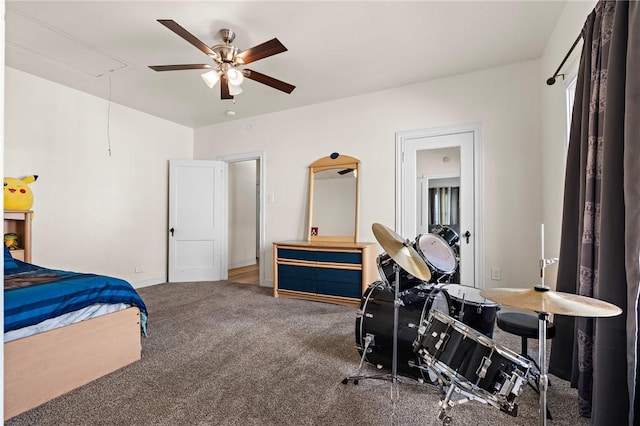 carpeted bedroom with ceiling fan