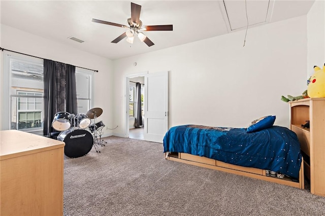 bedroom with ceiling fan and carpet floors