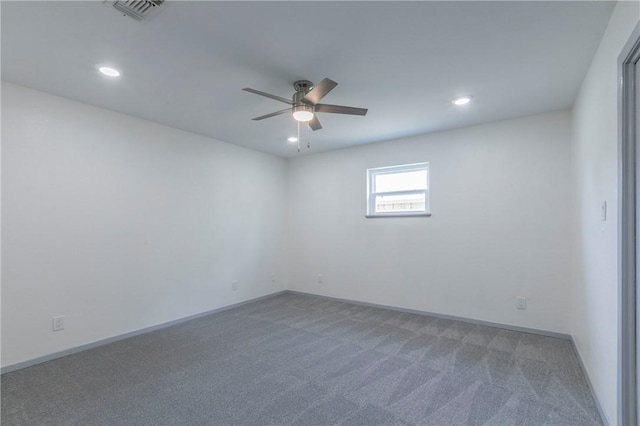 carpeted empty room with ceiling fan