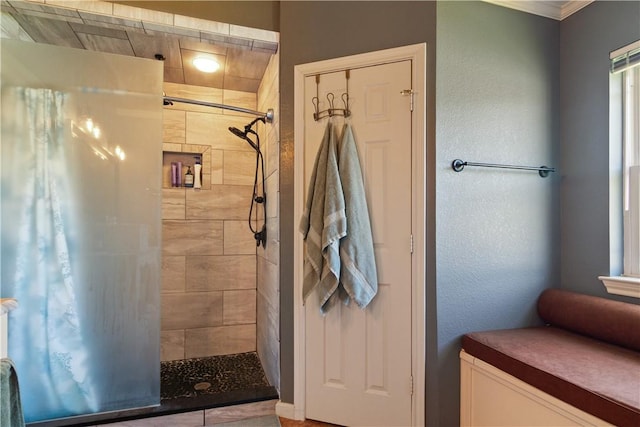 bathroom with tiled shower