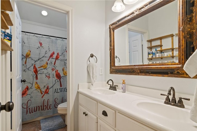 bathroom with vanity, crown molding, tile patterned flooring, toilet, and curtained shower