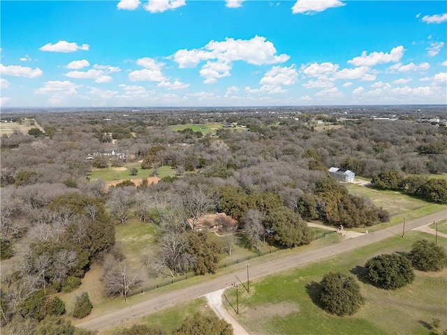 birds eye view of property featuring a rural view