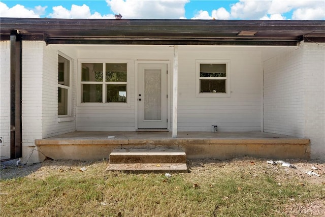 property entrance with a porch