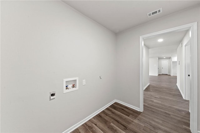 clothes washing area with electric dryer hookup, dark wood-type flooring, and washer hookup