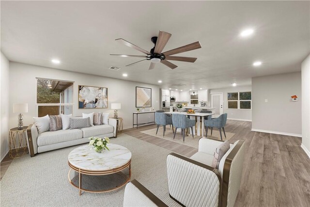 interior space featuring dark hardwood / wood-style flooring and ceiling fan