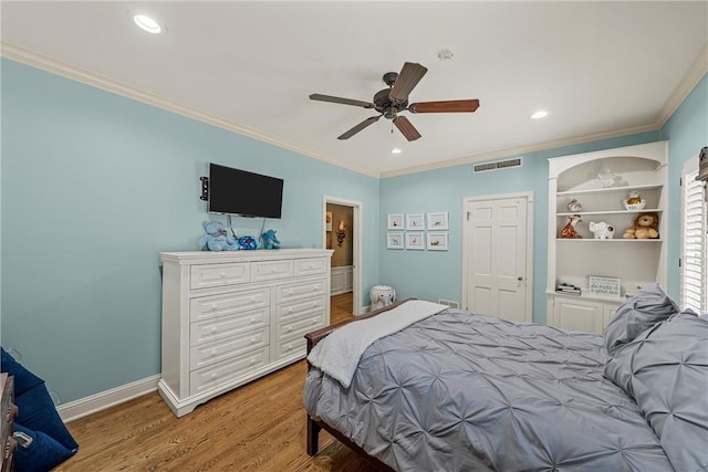 bedroom with wood-type flooring, ceiling fan, and ornamental molding