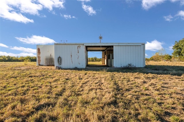 view of outdoor structure featuring a rural view