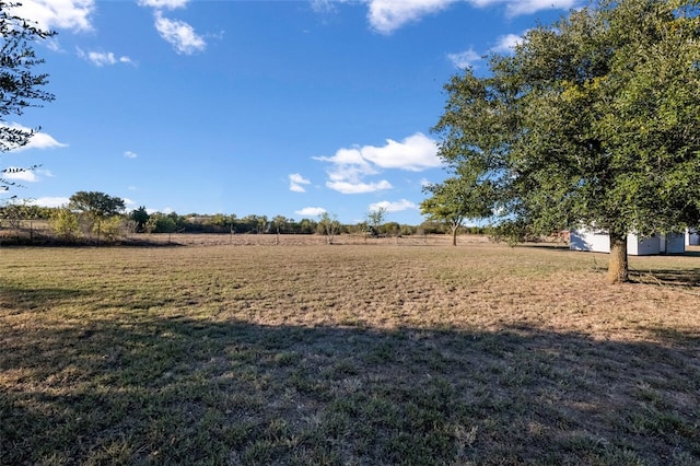 view of yard featuring a rural view