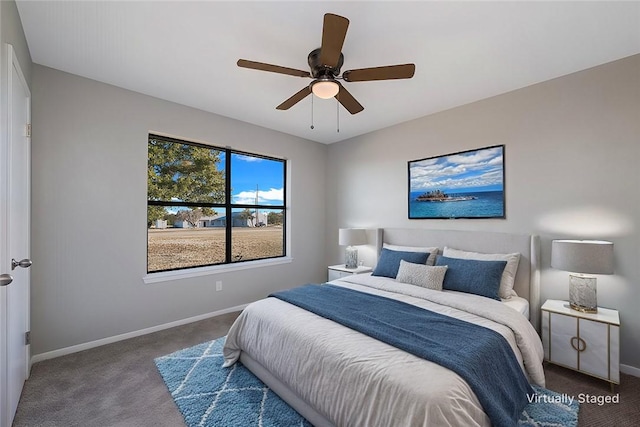 carpeted bedroom with ceiling fan